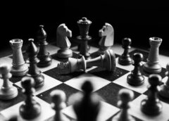 grayscale photography of chessboard game